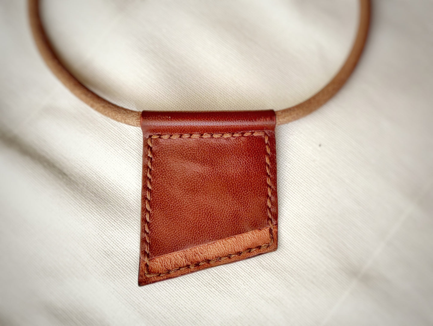 Geometric minimalist necklace made of brown leather