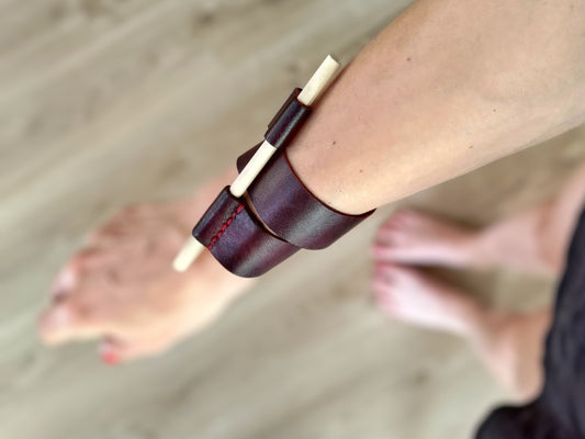 Red leather wrap around bracelet with wooden pin closure